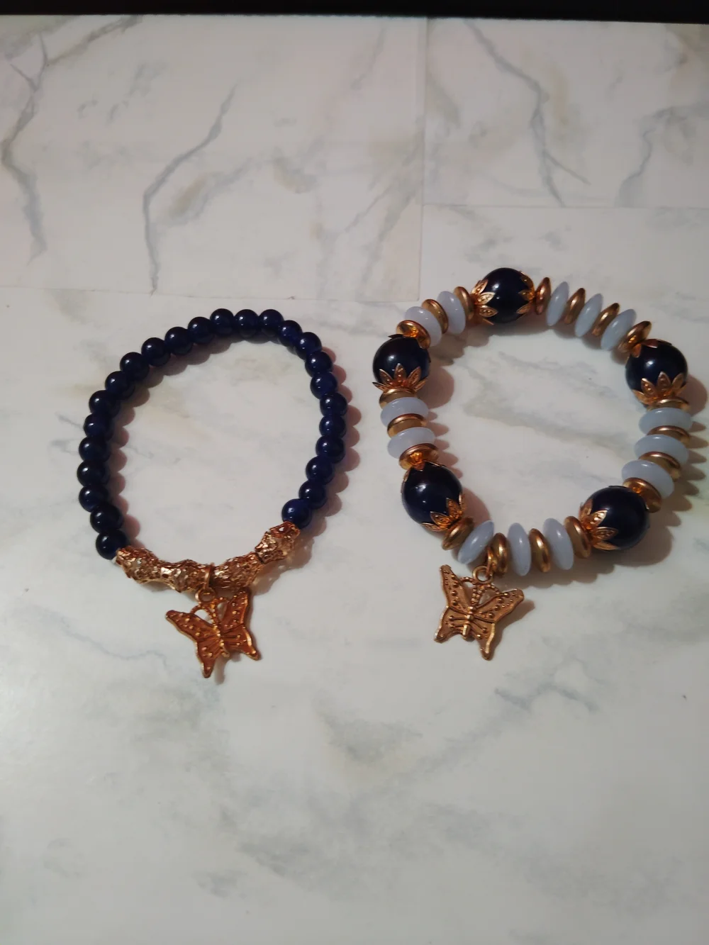 Gold Butterfly Charm Navy Bead Stretch Bracelet